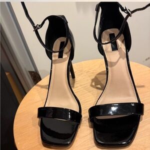 Black patent leather high heels